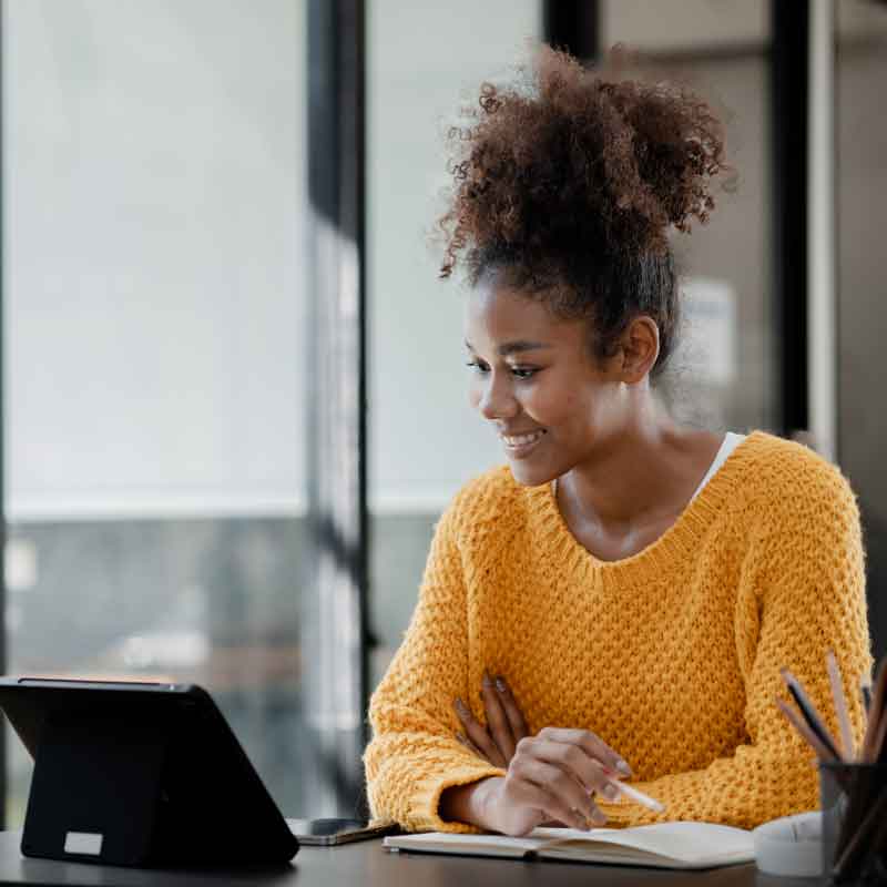 Young entrepreneur woman working at a laptop